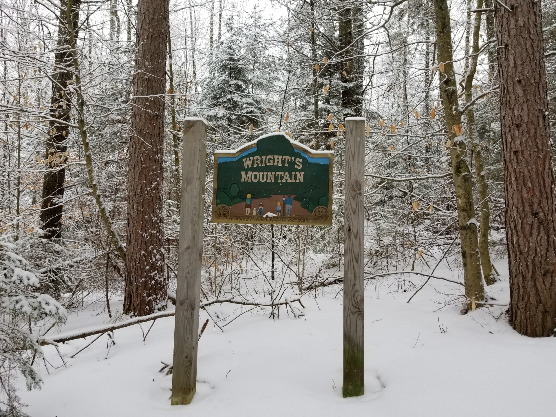 Wright's Mountain sign in snow