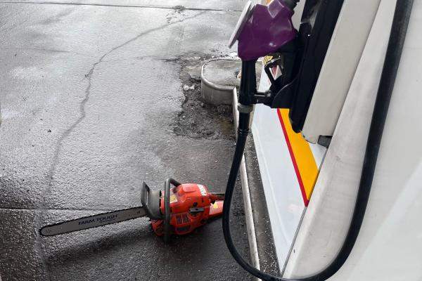 chainsaw and gas pump