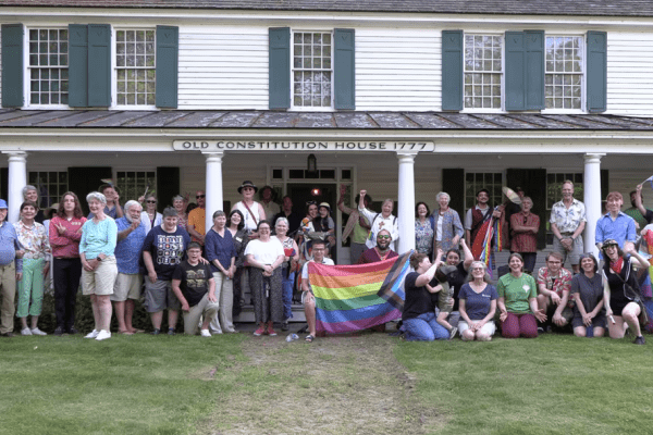 Group celebrating Pride Tree installation