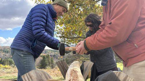 Three people pounds splints from a black ash log.