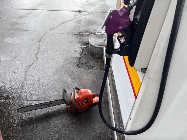 chainsaw and gas pump